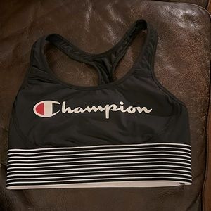 Champion sports bra. Size small. Black with black and white striped band.